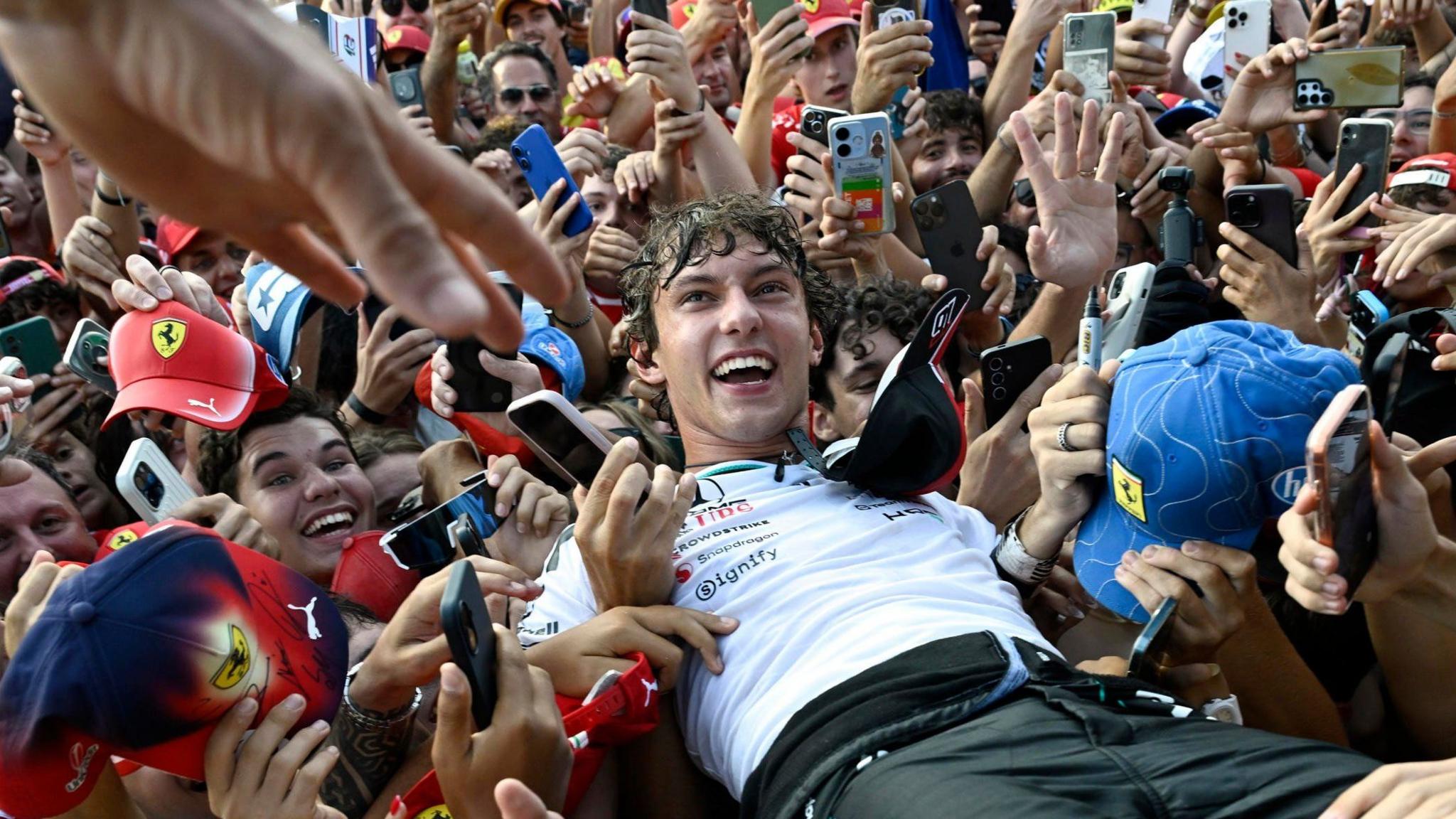 Kimi Antonelli crowd-surfing after winning the Italian Grand Prix