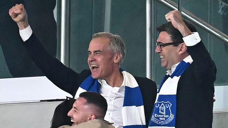 Prime Minister Andy Burnham and Canada counterpart Mark Carney - both Everton fans - celebrate the winner against Wolves