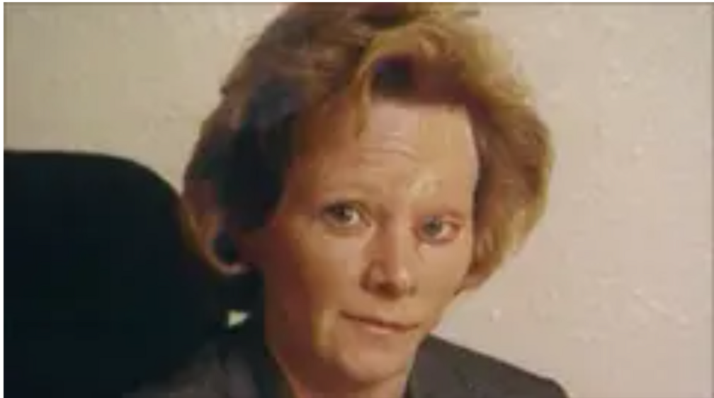 This is an old photo of a woman with blonde hair