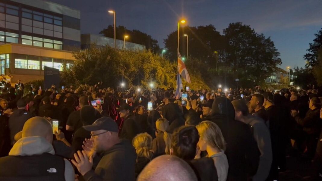 Protesters mass outside a police investigations centre in Basingstoke