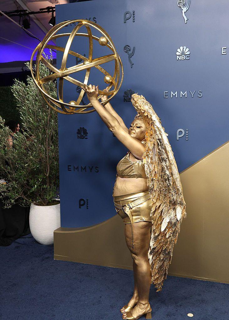 Megan Stalter dresses as an Emmy Awards statue on the blue carpet at the 78th Emmy Awards held at Peacock Theater on September 14, 2026 in Los Angeles, California.