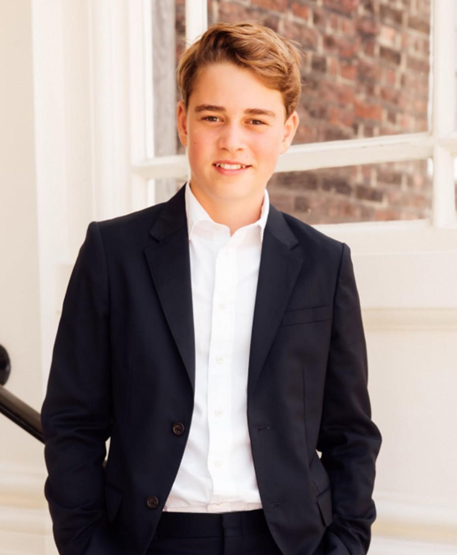 A posed photo of Prince George in a suit