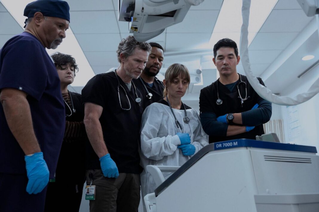 The Pitt is up for 25 Emmys – but the show’s biggest fans are real-life doctors A group of medical staff gather round a hospital machine