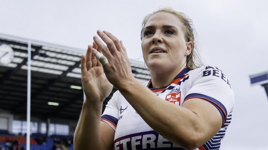 England’s Hardcastle announces international retirement Amy Hardcastle in an England shirt applauding fans