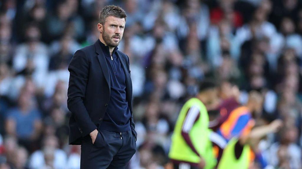 Michael Carrick, Manager / Head Coach of Manchester United looks on