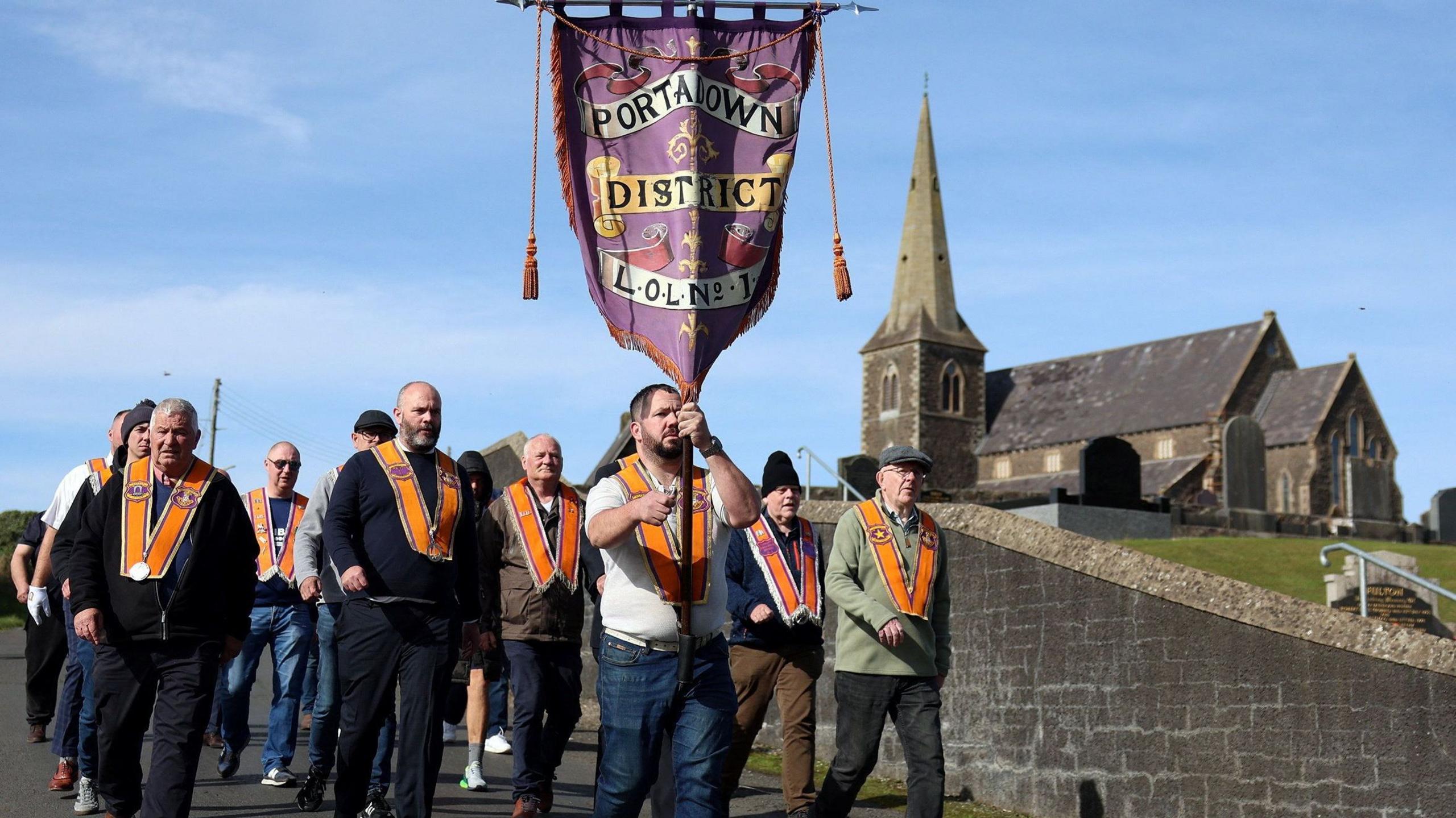 Members of the Orange Order marching from Drumcree church