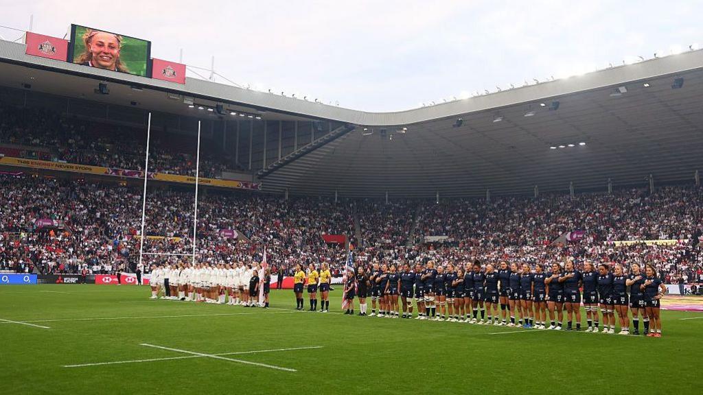 England line up for anthems against the United States