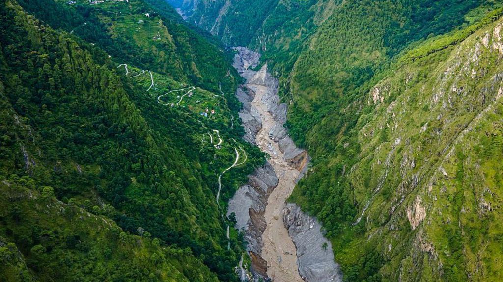 An aerial view shows the aftermath of flooding on August 26 along the Bhotekoshi River, which affected low-lying areas and settlements near the riverbanks in Syabrubesi Bazar, Rasuwa, Nepal, on September 1, 2026.