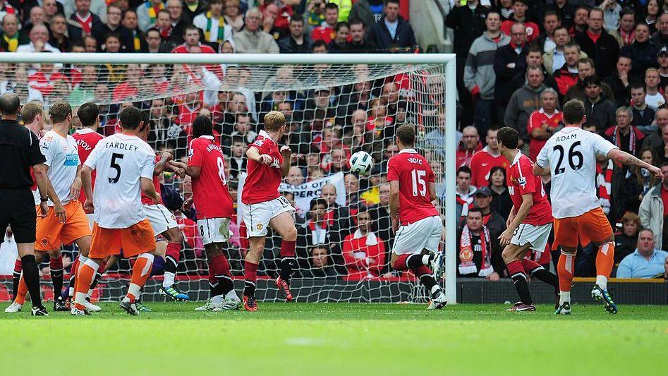 Charlie Adam scores at Old Trafford