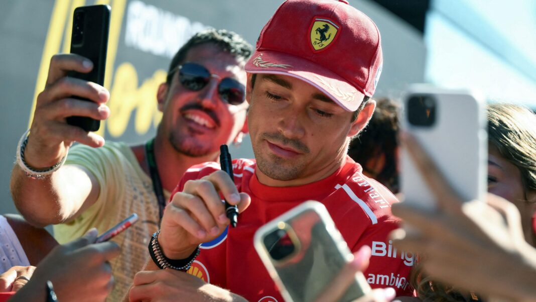 Is ‘disruptor’ Antonelli winning hearts in Italy, where Ferrari is F1? Ferrari driver Charles Leclerc signing autographs for fans at the Italian Grand Prix before first practice at Monza on Friday