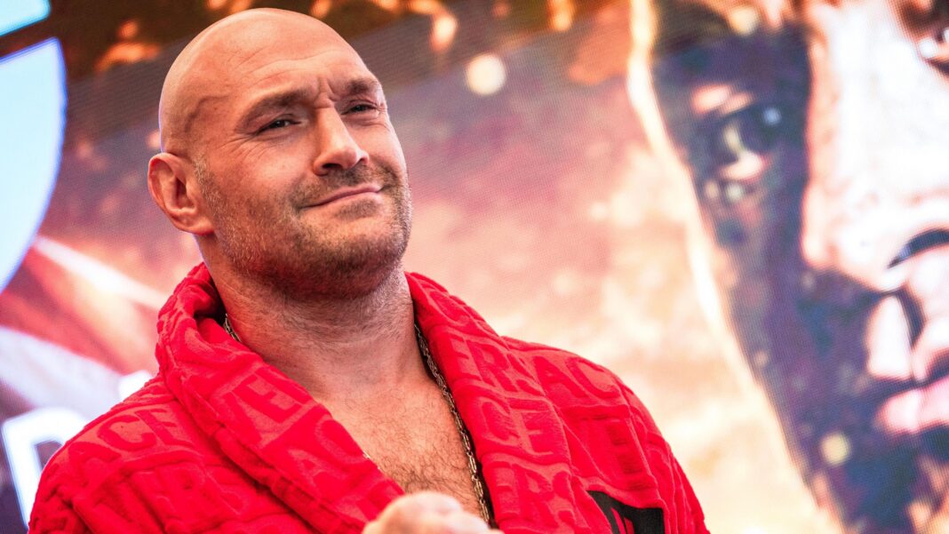 Garcia v Benn – all you need to know Tyson Fury smiles wearing a red gown