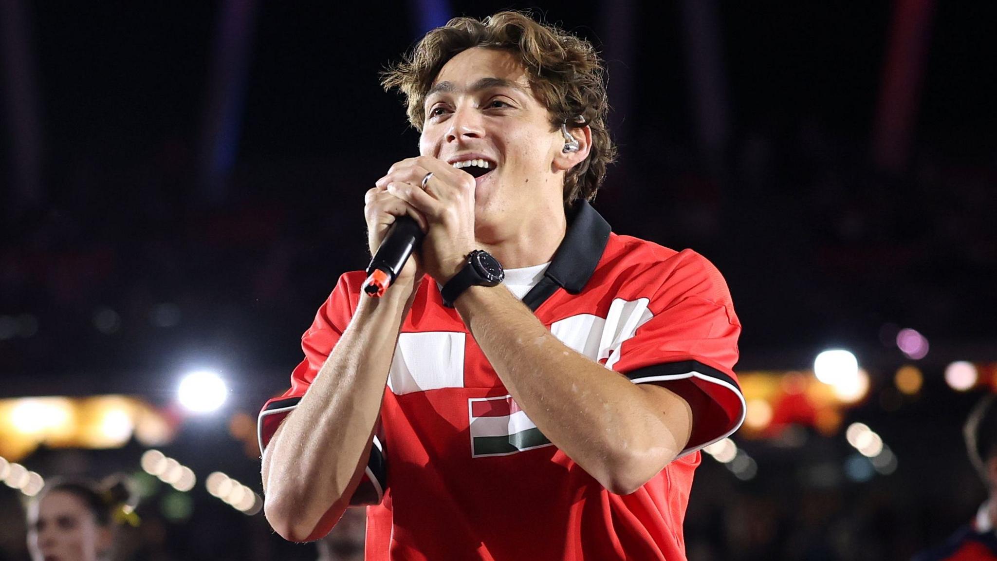 Armand Duplantis performs his song 'Gold' at the end of the inaugural Ultimate Championship