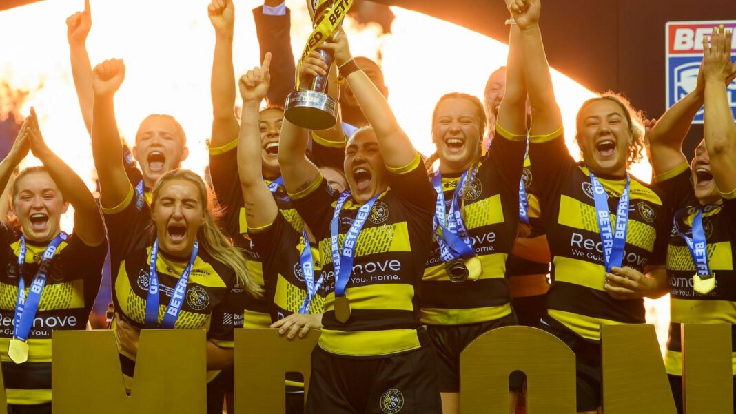York players lift the trophy