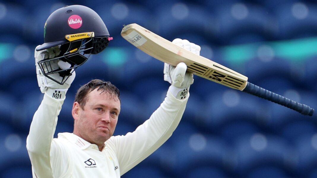 Glamorgan great Ingram retires for coaching role Colin Ingram holds bat and helmet aloft