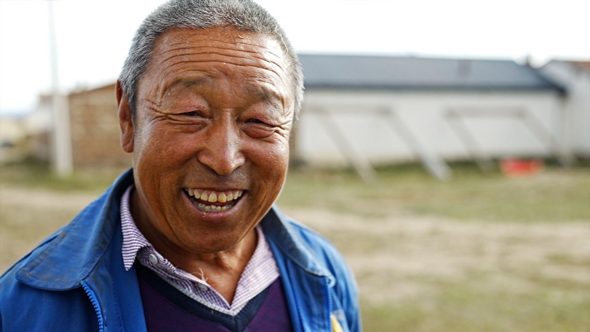 A smiling farmer