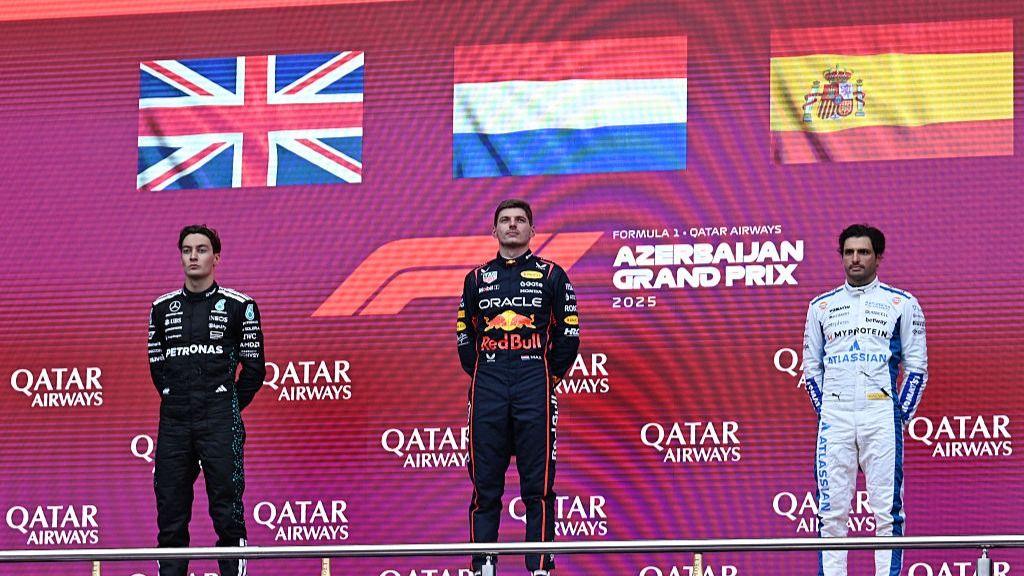 George Russell, Max Verstappen and Carlos Sainz on the podium after the 2025 Azerbaijan Grand Prix