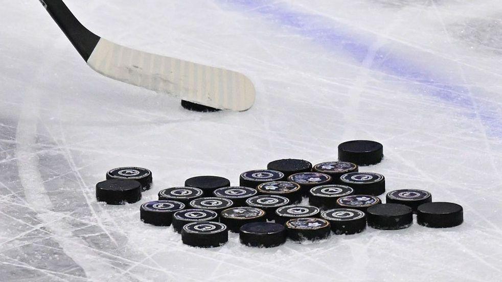 A general stock image of pucks with a stick is seen during warm ups prior to game two of the AHL Calder Cup Finals between the Toronto Marlies and the Chicago Wolves
