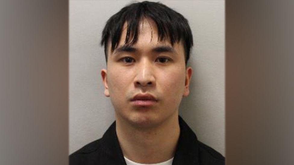 Police custody image of Zhenhao Zou