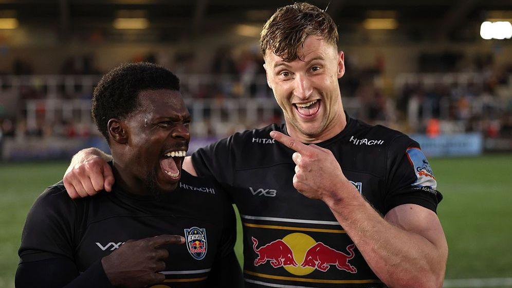 Christian Wade (left) and Alex Hearle celebrate Newcastle's win over Sale last season
