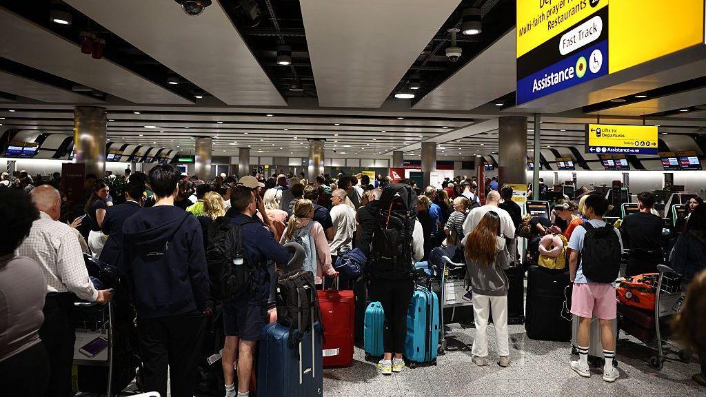 What are my rights if my flight is cancelled or delayed? Delayed passengers wait and queue with their luggage at Terminal 3 of London Heathrow airport.