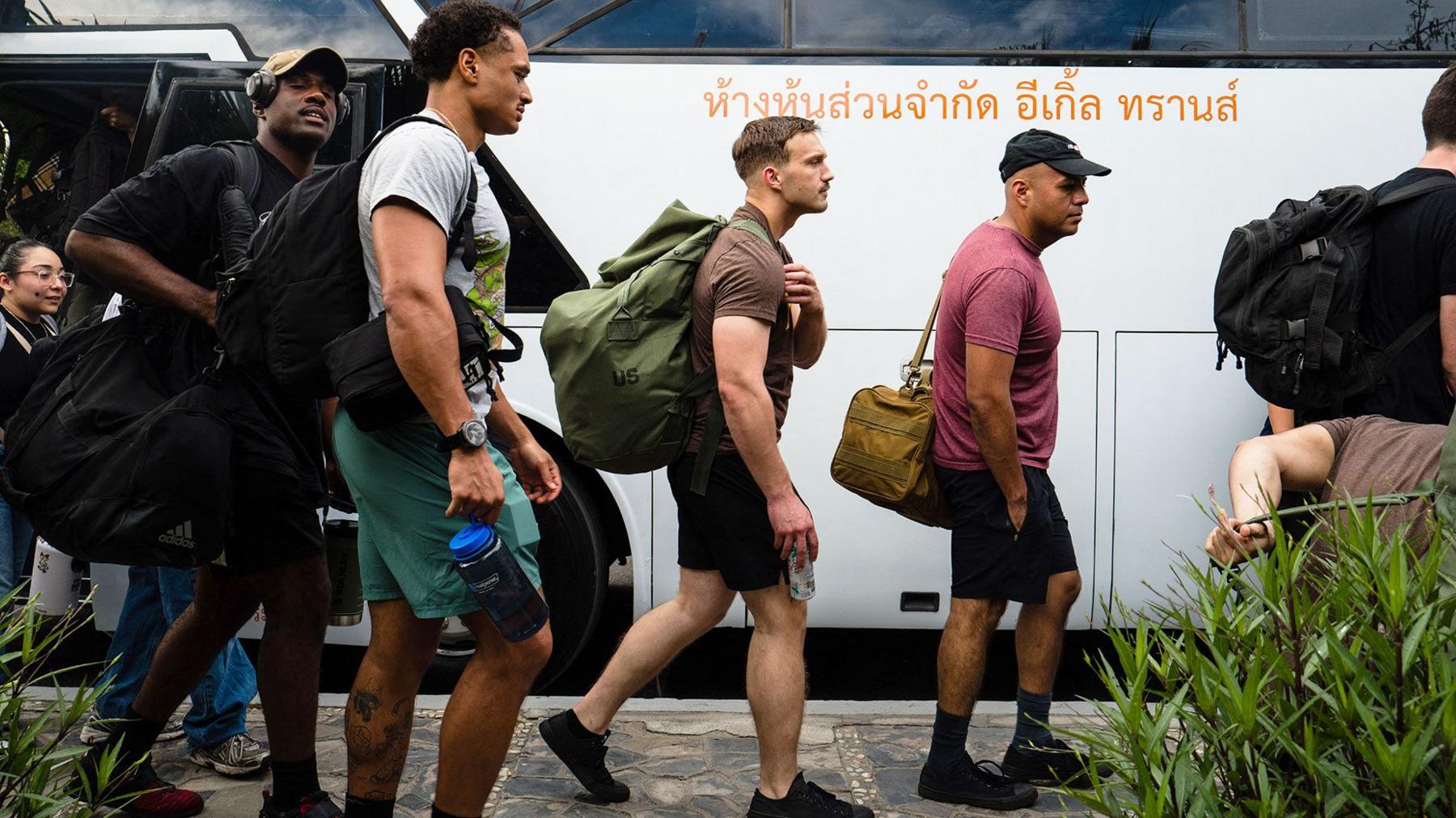 Three young US military men arrive at Hard Rock Hotel Pattaya for a welcoming ceremony
