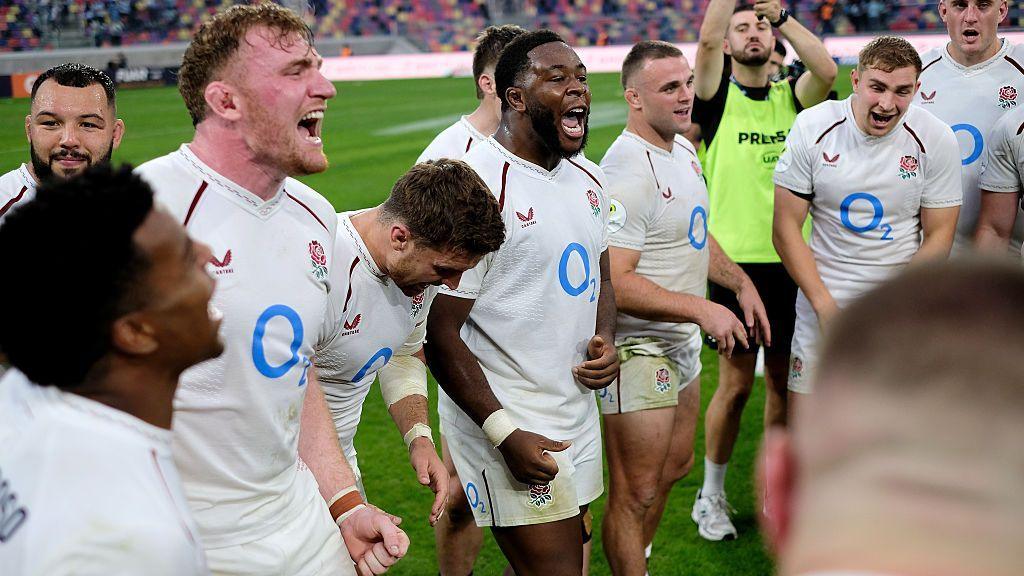 England celebrate beating Argentina