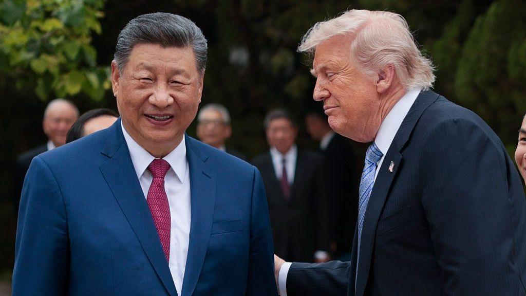 US President Trump pictured with Chinese President Xi Jinping during their last meeting, in Beijing, in May