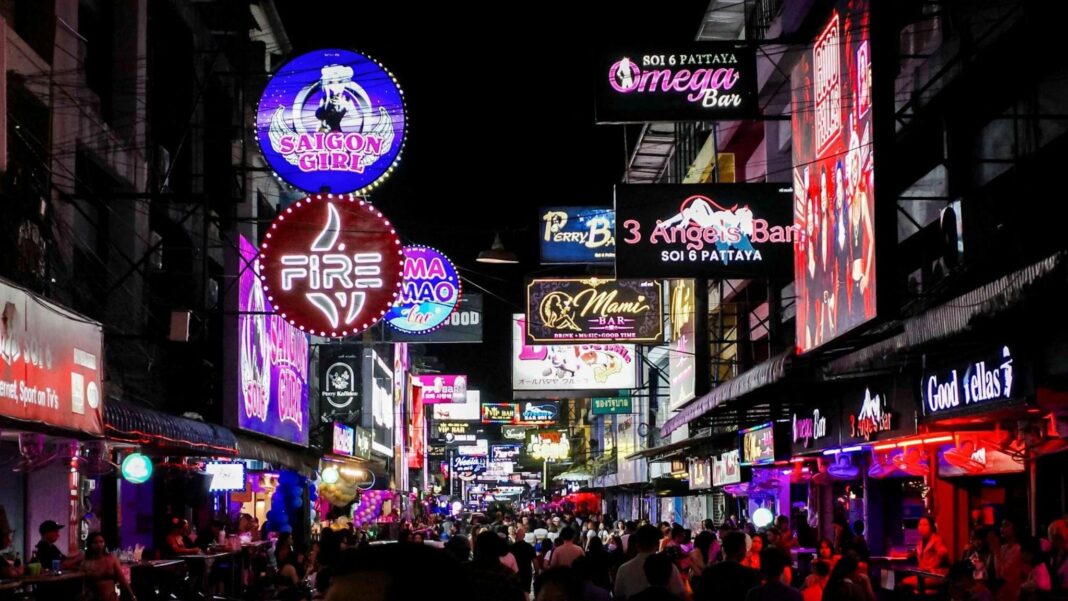 US sailors go shopping before hitting the bars in Thailand after 250-day voyage People walk along a street lined with bars and entertainment venues, in Pattaya City, Thailand.