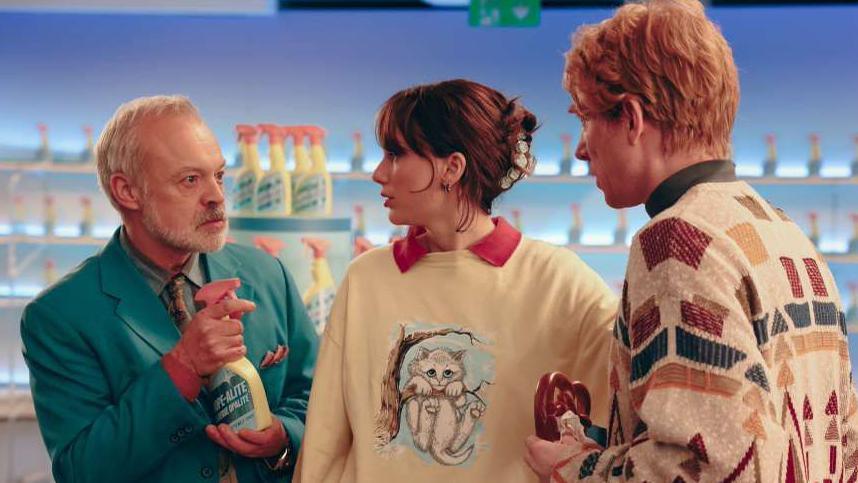 Graham Norton, Taylor Swift and Domhnall Gleeson in the video for Taylor Swift's Opalite