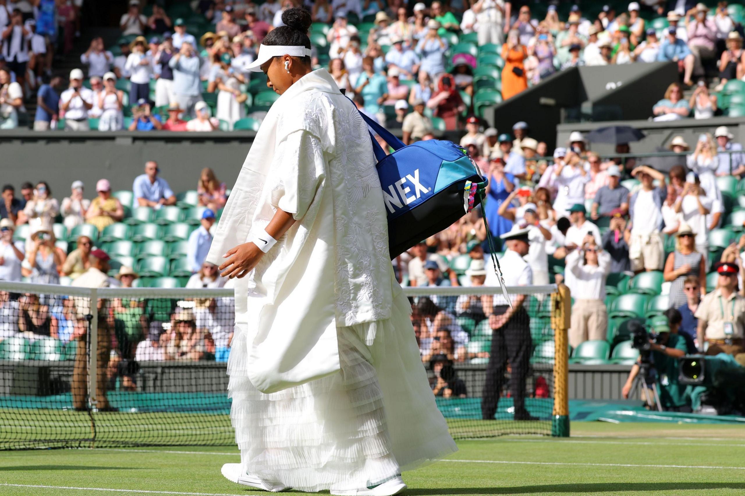 Naomi Osaka walks out at Wimbledon wearing a Japanese kimono