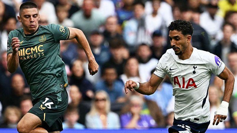 Everton's Vitalii Mykolenko in a race for possession with Spurs forward Omar Marmoush in the Premier League game at Tottenham Hotspur Stadium.