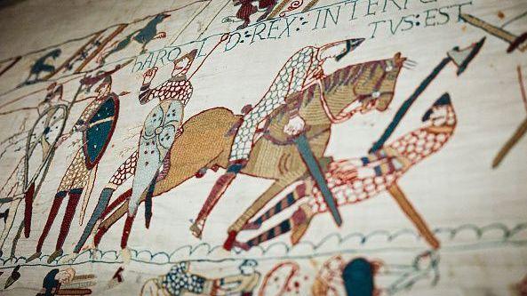 Tapestry of embroidered figures on horseback