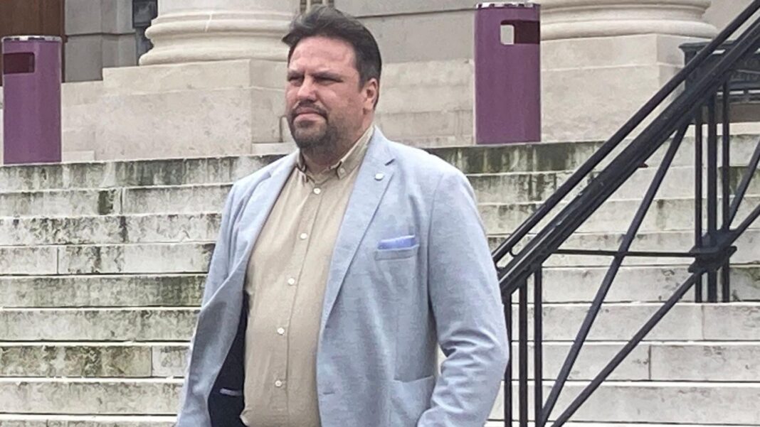 Driver who killed Team GB triathlete to be deported Vasile Barbu in a blue jacket outside court. He has a cream shirt and, and short dark hair and a goatee.