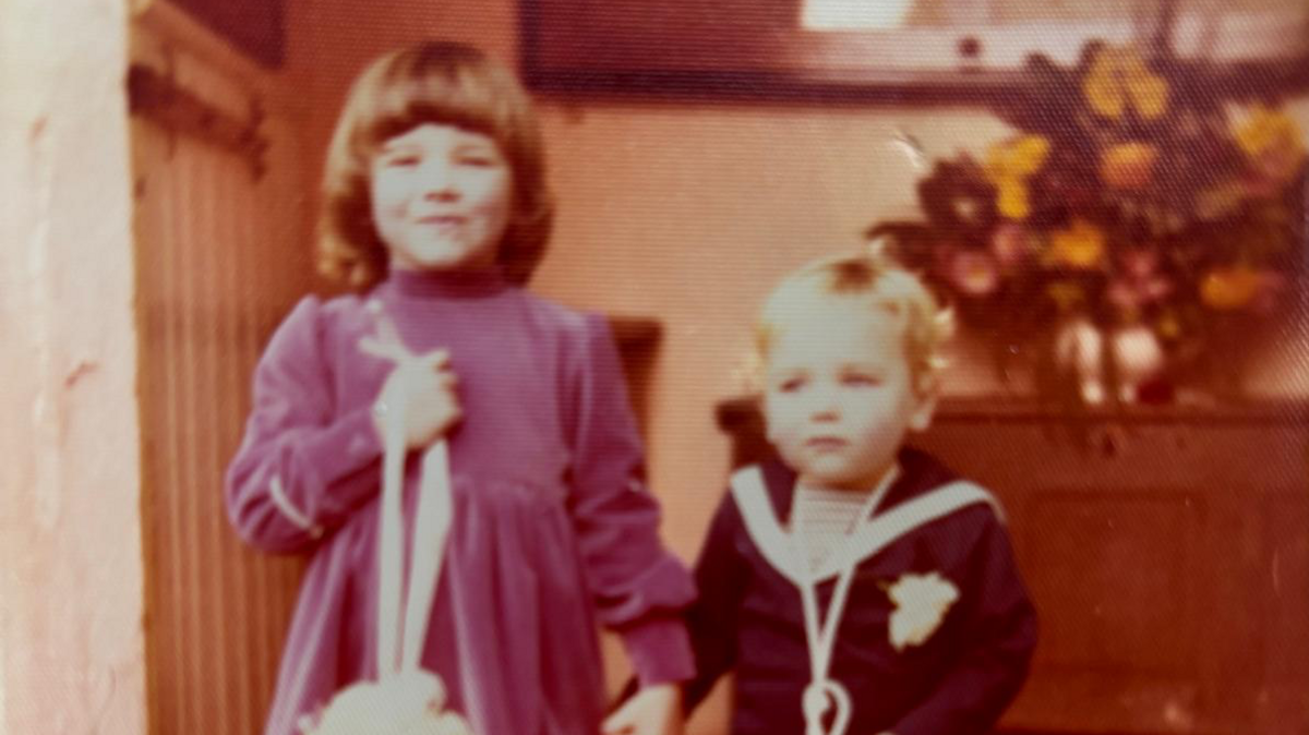 Rachel and Matthew as children in an old colour photograph