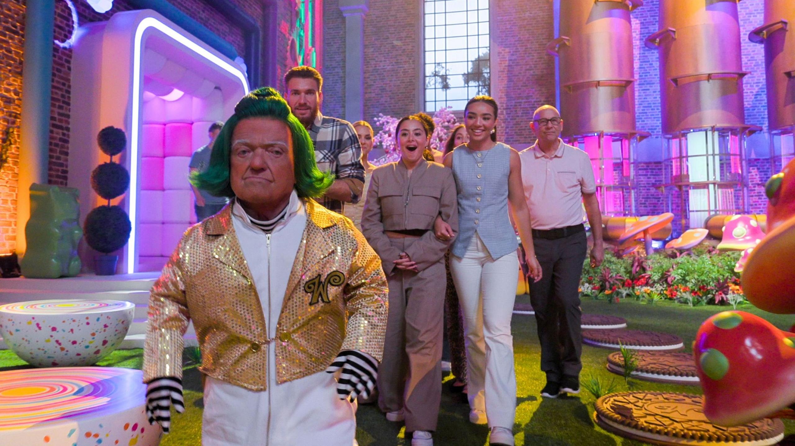 Rusty Goffe in costume leading a group of contestants during the new Netflix show