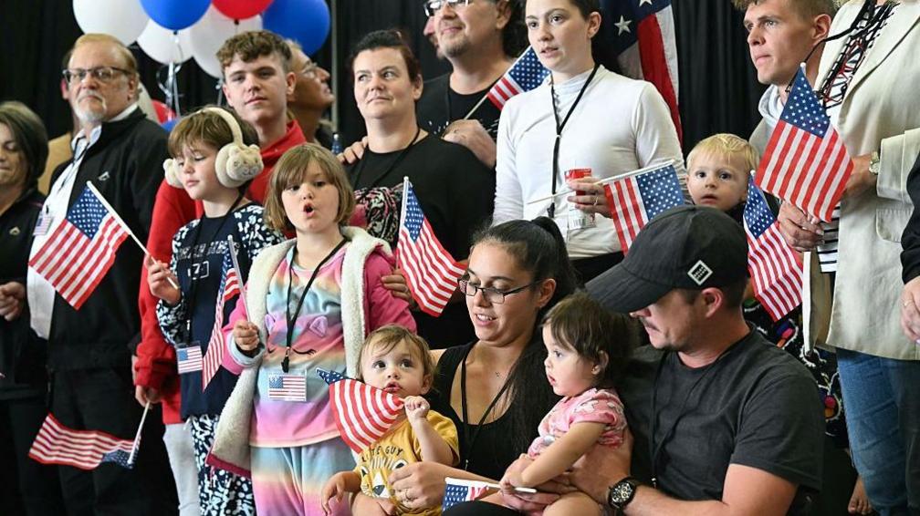 The first group of Afrikaners from South Africa to arrive for resettlement  at Washington Dulles International Airport in Virginia, on 12 May,