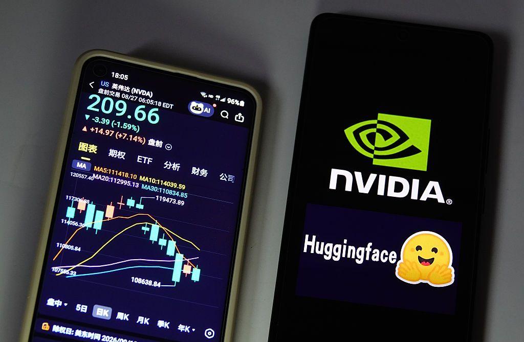 The stock price of NVIDIA displayed on a smartphone with NVIDIA and Hugging Face logo displayed in a smartphone in Yichang City, Hubei Province, China, on August 27, 2026.