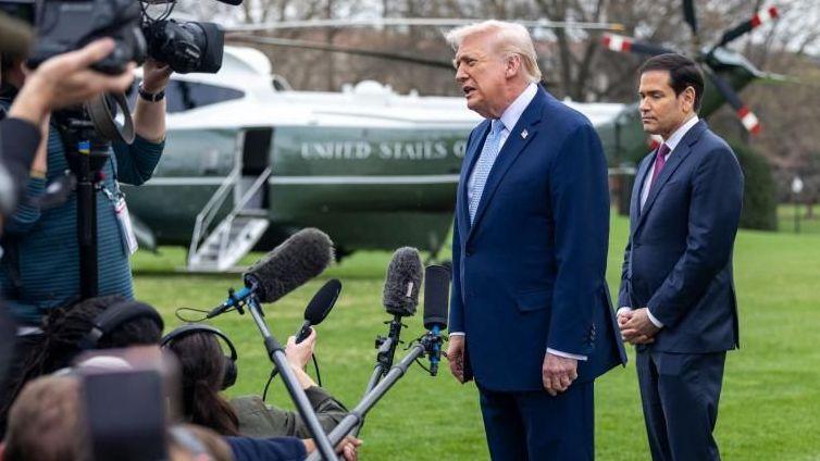 Donald Trump and Marco Rubio speaking to reporters