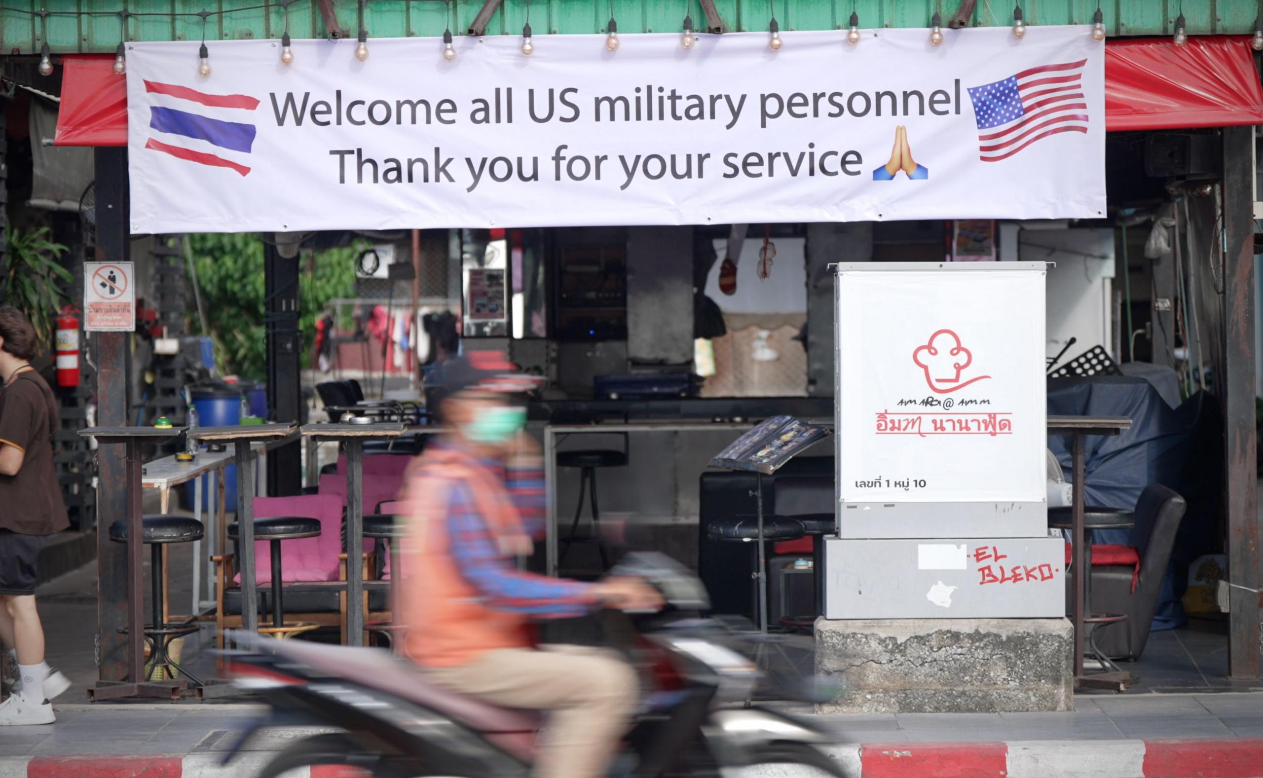 A banner reading "Welcome all US military personnel - thank you for your service"