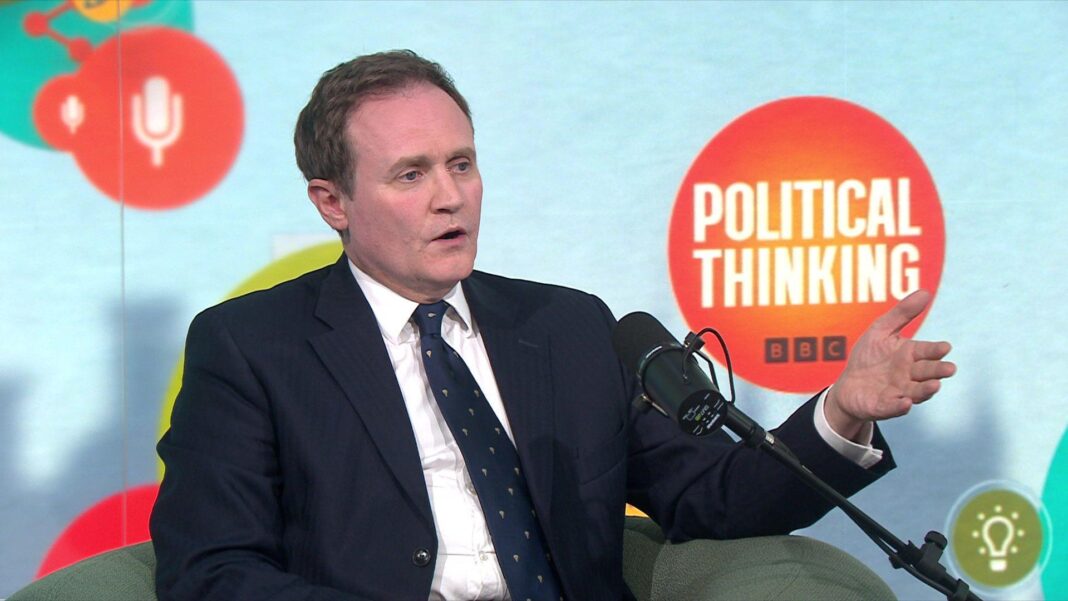 ‘Don’t be silly’ over Falklands and Irish unity, top Tory tells Trump Tom Tugendhat gestures as he sits on a green chair in front of a blue background with the 'Political Thinking' logo in an orange bubble.