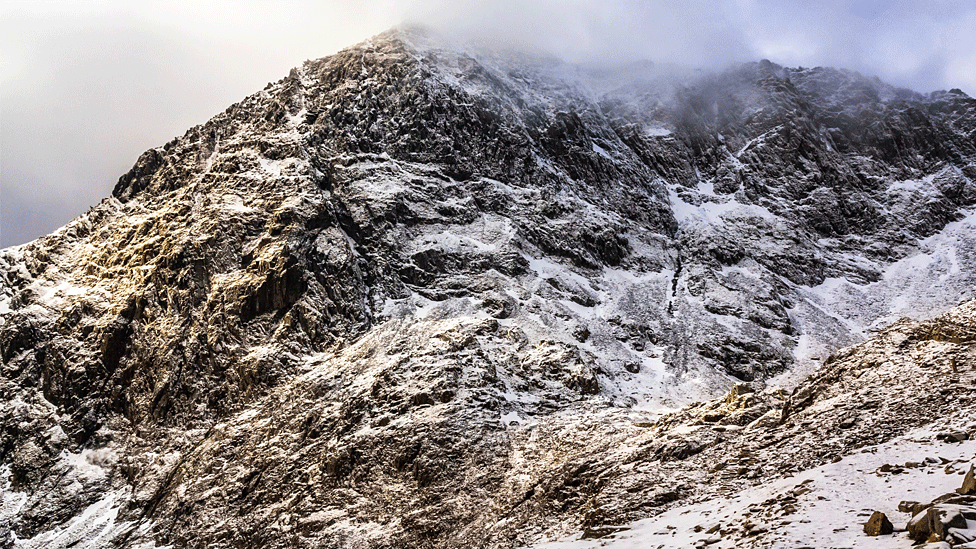 Peak of Yr Wyddfa covered in snow