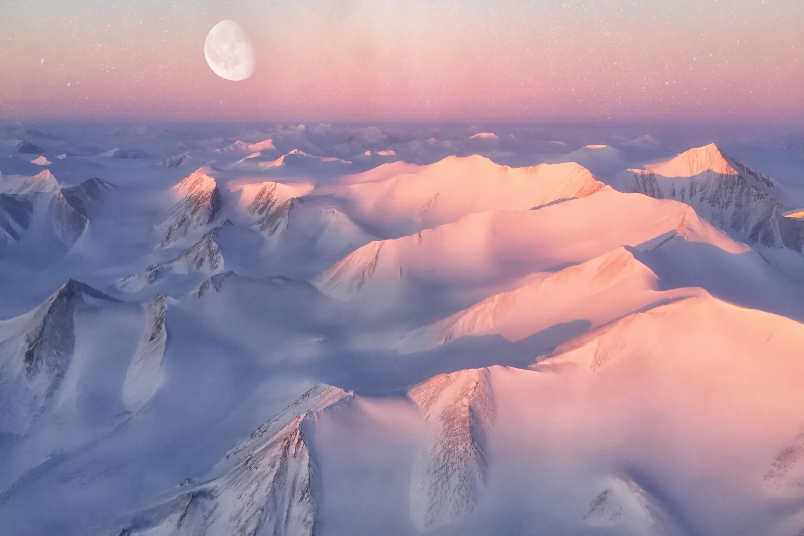 Image may contain Nature Outdoors Scenery Sky Mountain Mountain Range Peak and Horizon