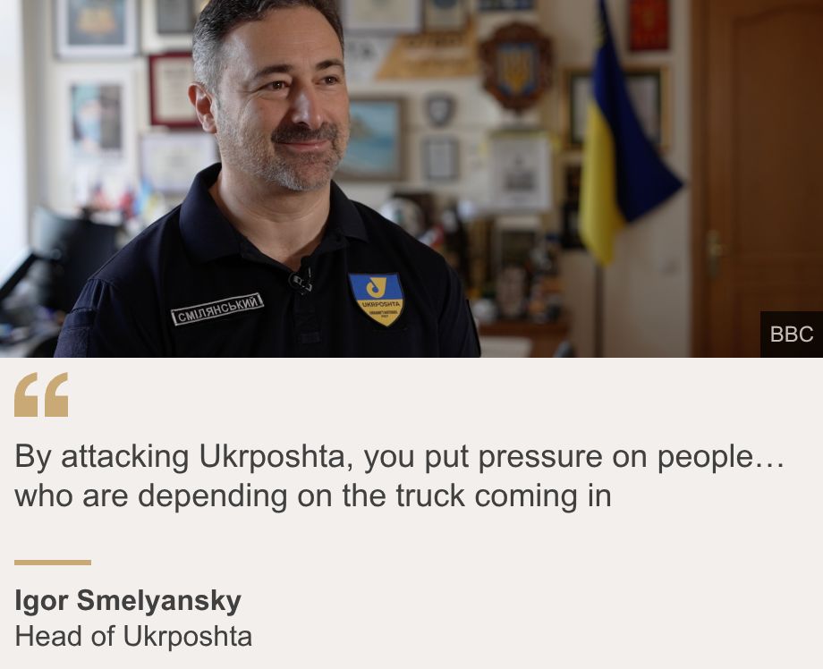"By attacking Ukrposhta, you put pressure on people… who are depending on the truck coming in", Source: Igor Smelyansky, Source description: Head of Ukrposhta, Image: Igor Smelyansky stands in his blue Ukrposhta shirt and smiles at the camera. He has greying dark hair, and wears stubble with a smile
