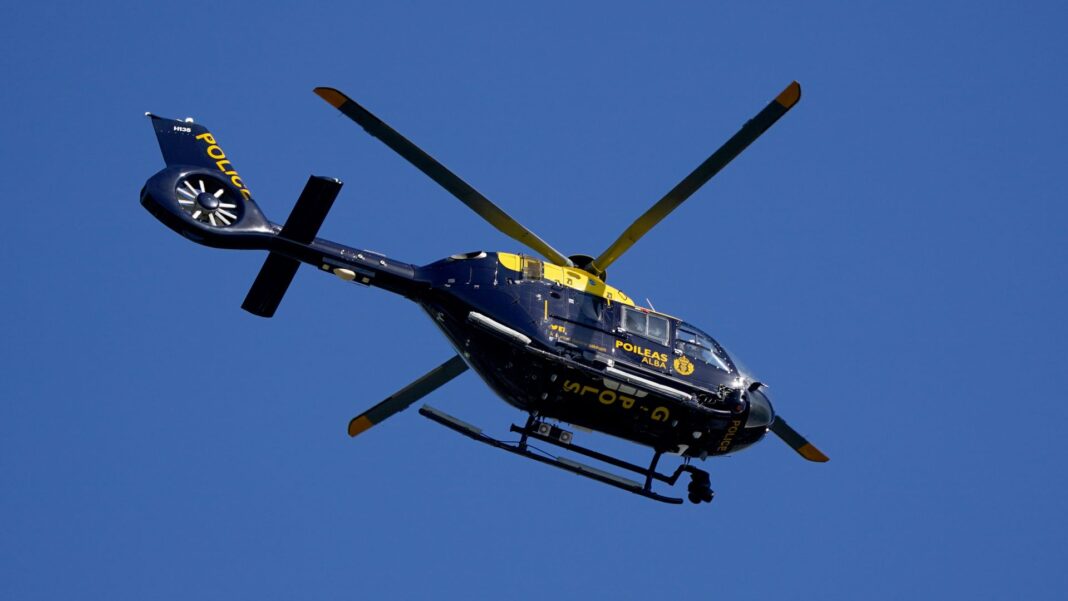Hunt for women and man after driver killed in hit-and-run crash near airport Skynews police scotland helicopter 7344830