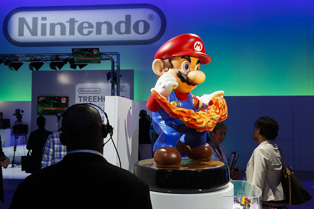 Mario promotes Nintendo Co.'s Amiibo collectible characters featuring NFC technology