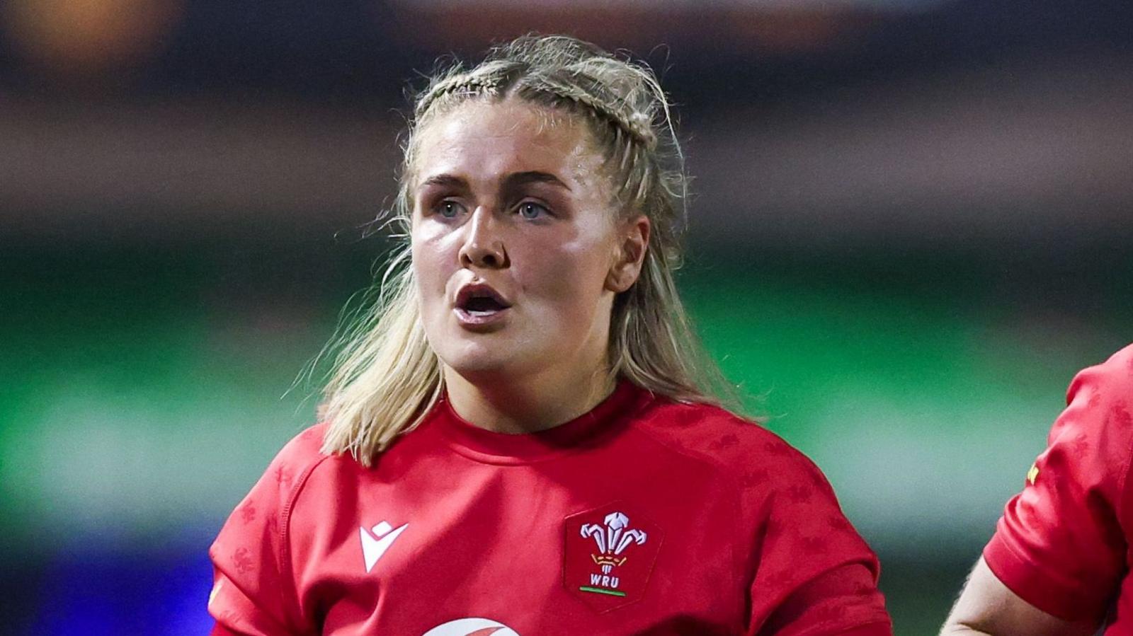 Alex Callender in Wales' red kit