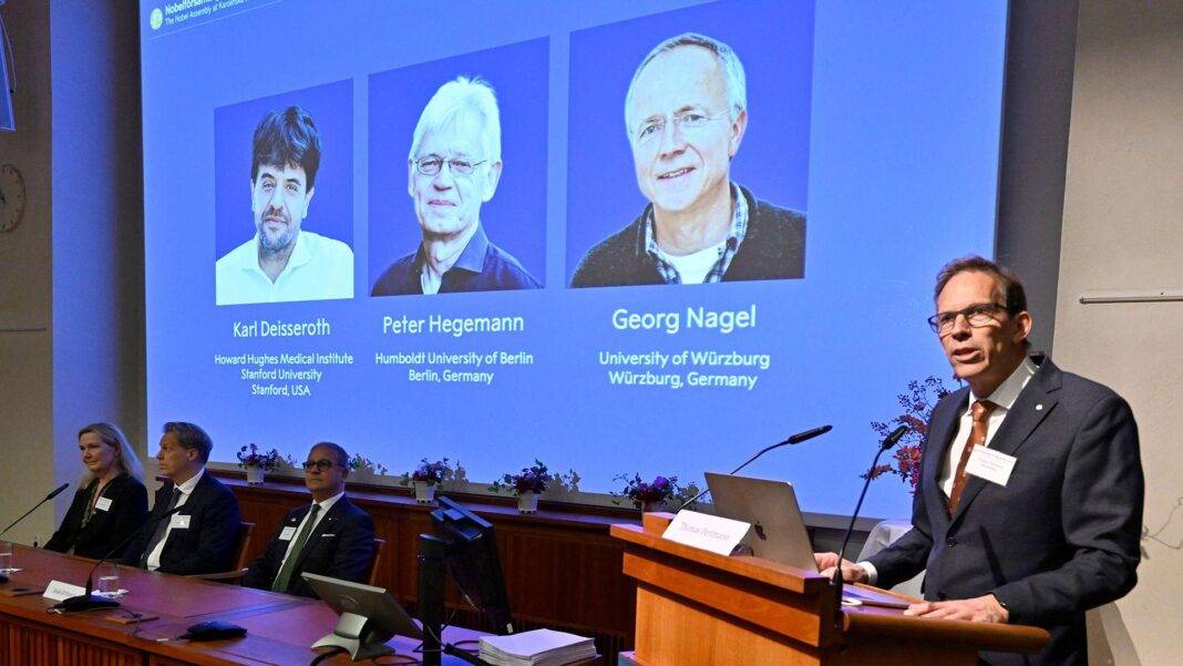 Nobel Prize awarded for showing inner workings of the brain Nobel Committee Secretary General Thomas Perlmann (R) speaks to the media in front of a screen displaying the names of this year's laureates (L-R) Karl Deisseroth, Peter Hegemann and Georg Nagel during the announcement of the winners of the 2026 Nobel Prize in Physiology or Medicine at the Karolinska Institute in Stockholm, Sweden, on October 5, 2026.