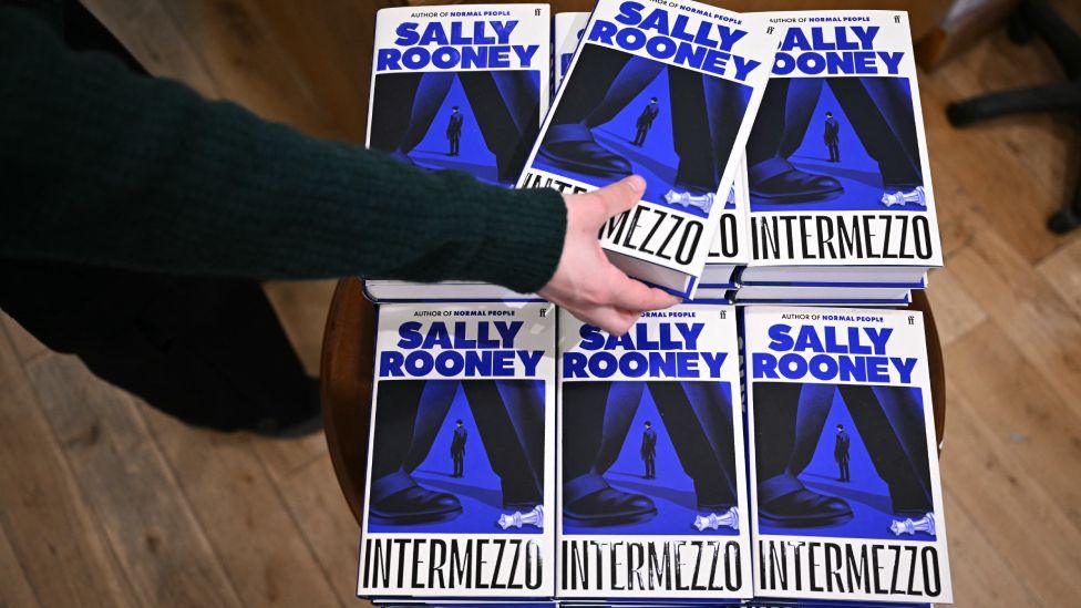 Copies of Irish author Sally Rooney's newly published book 'Intermezzo', are pictured in a book shop in London on September 24, 2024