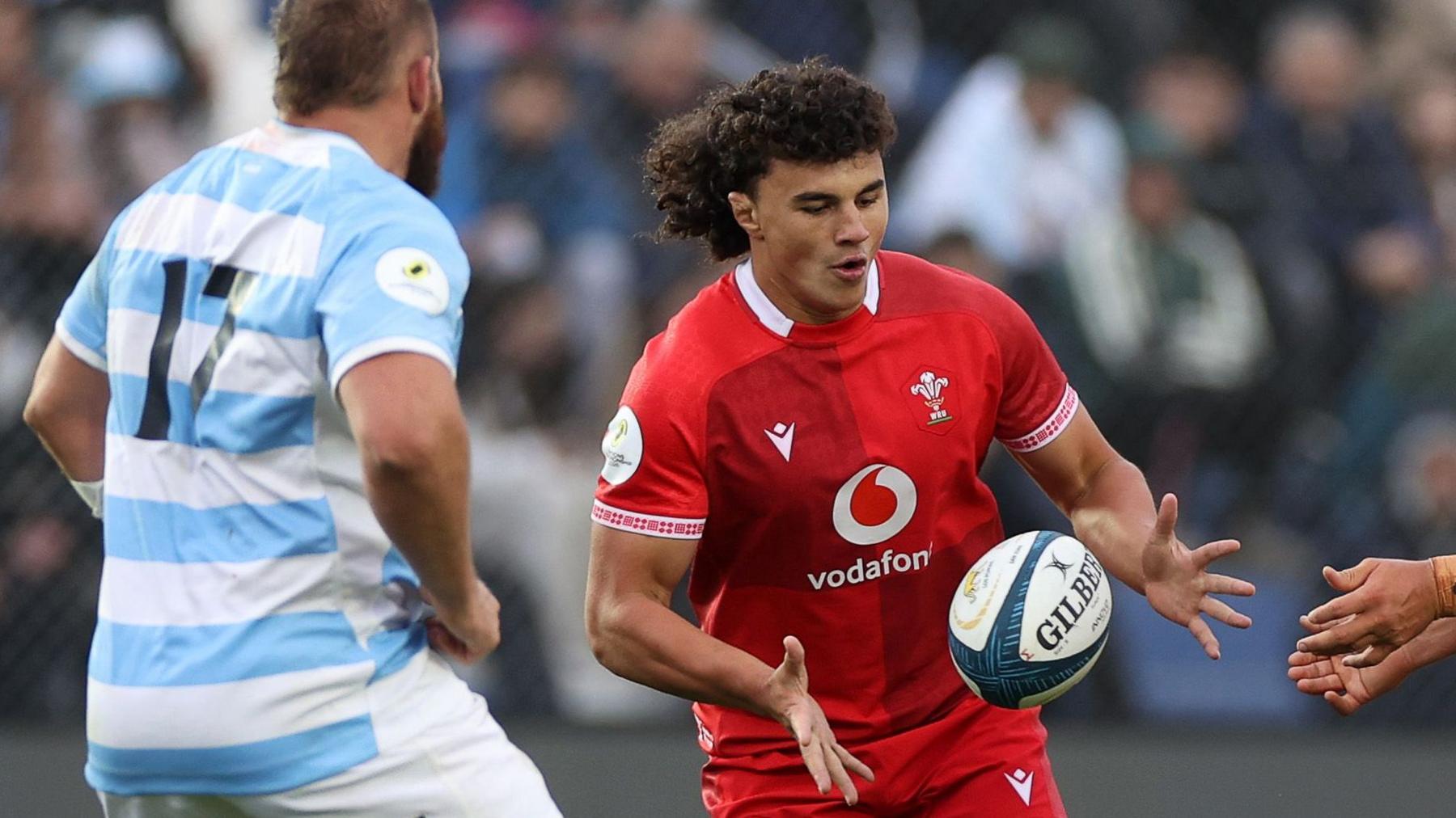 Kane James catches the ball for Wales against Argentina