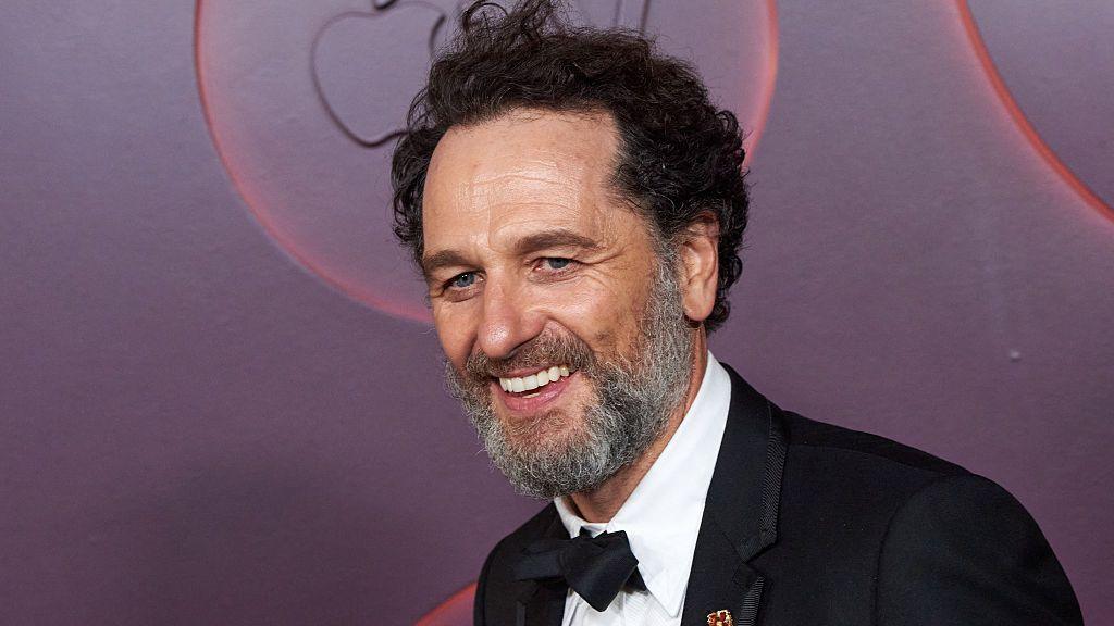 Actor Matthew Rhys in a black tuxedo